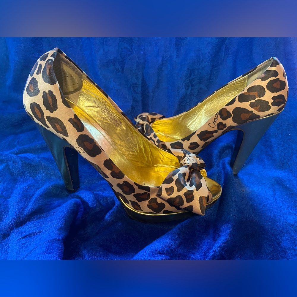 Beautiful coach leopard shoes with gold heels